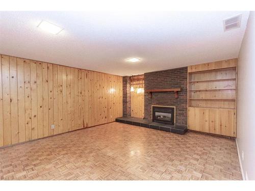 35 Barner Avenue, Red Deer, AB - Indoor With Fireplace