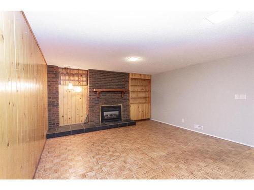 35 Barner Avenue, Red Deer, AB - Indoor With Fireplace