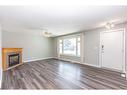 35 Barner Avenue, Red Deer, AB  - Indoor Photo Showing Other Room With Fireplace 