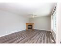 35 Barner Avenue, Red Deer, AB  - Indoor Photo Showing Other Room With Fireplace 