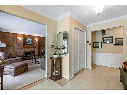 560 Wahstao Road Nw, Edmonton, AB - Indoor With Fireplace