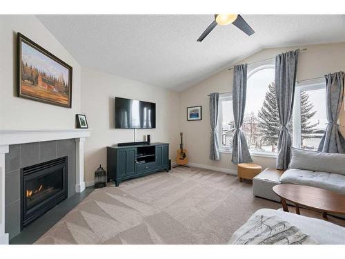 16117 Shawbrooke Road Sw, Calgary, AB - Indoor Photo Showing Living Room With Fireplace