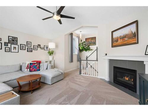 16117 Shawbrooke Road Sw, Calgary, AB - Indoor Photo Showing Living Room With Fireplace