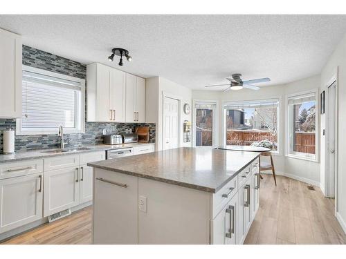 16117 Shawbrooke Road Sw, Calgary, AB - Indoor Photo Showing Kitchen With Double Sink