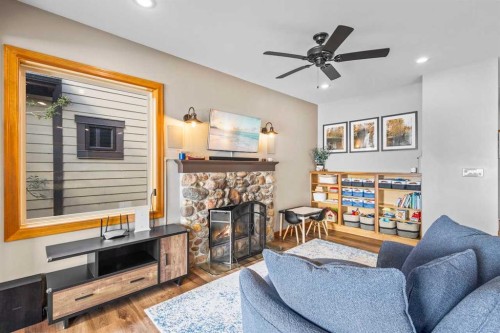 152 Jarvis Bay Drive, Jarvis Bay, AB - Indoor Photo Showing Living Room With Fireplace