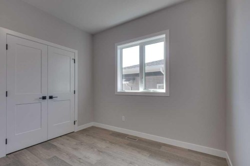 117 Gray Close, Sylvan Lake, AB - Indoor Photo Showing Other Room