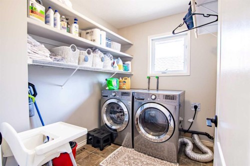 5008 41 Street, Sylvan Lake, AB - Indoor Photo Showing Laundry Room