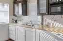 301 Waterloo Street, Veteran, AB  - Indoor Photo Showing Kitchen With Double Sink 