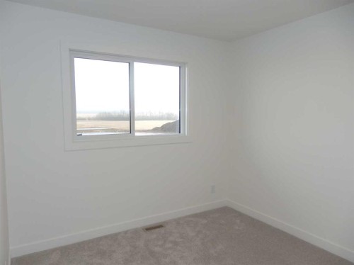 30 Inglis Crescent, Sylvan Lake, AB - Indoor Photo Showing Other Room
