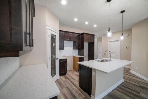 5728 55 Avenue, Camrose, AB - Indoor Photo Showing Kitchen With Double Sink With Upgraded Kitchen