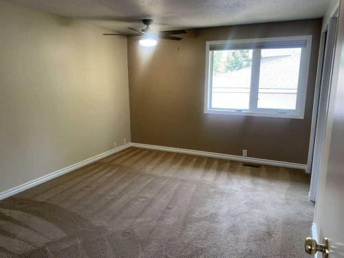 471 Dalmeny Hill Nw, Calgary, AB - Indoor Photo Showing Other Room