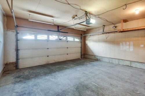 9-2 Hinshaw Drive, Sylvan Lake, AB - Indoor Photo Showing Garage
