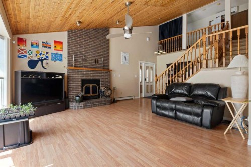 119 3Rd Avenue West, Alliance, AB - Indoor Photo Showing Living Room With Fireplace