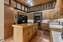 119 3Rd Avenue West, Alliance, AB  - Indoor Photo Showing Kitchen With Double Sink 