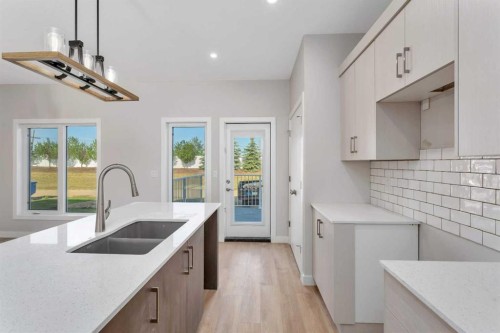 101 Aztec Crescent, Blackfalds, AB - Indoor Photo Showing Kitchen With Double Sink