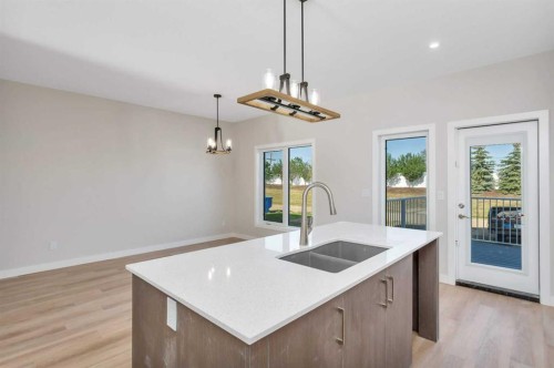 101 Aztec Crescent, Blackfalds, AB - Indoor Photo Showing Kitchen With Double Sink With Upgraded Kitchen