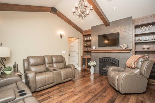 32 Sagewood Close, Red Deer, AB - Indoor Photo Showing Living Room With Fireplace