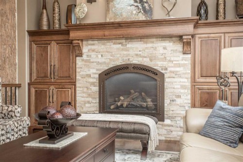 32 Sagewood Close, Red Deer, AB - Indoor Photo Showing Living Room With Fireplace
