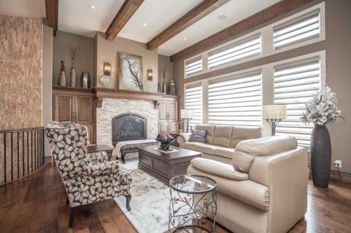 32 Sagewood Close, Red Deer, AB - Indoor Photo Showing Living Room With Fireplace