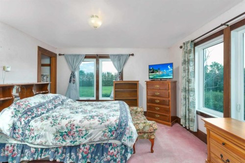 32328 Range Road 42, Rural Mountain View County, AB - Indoor Photo Showing Bedroom