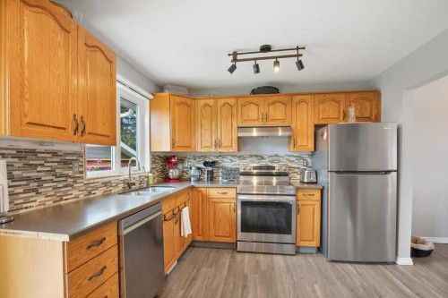 36 Harvey Close, Red Deer, AB - Indoor Photo Showing Kitchen With Stainless Steel Kitchen With Double Sink