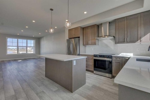 3479 Chestermere Boulevard, Chestermere, AB - Indoor Photo Showing Kitchen With Stainless Steel Kitchen With Upgraded Kitchen