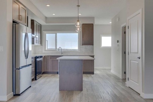 3479 Chestermere Boulevard, Chestermere, AB - Indoor Photo Showing Kitchen With Stainless Steel Kitchen With Upgraded Kitchen