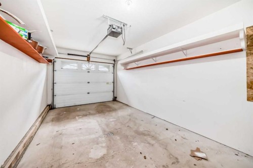 16E-32 Daines Avenue, Red Deer, AB - Indoor Photo Showing Garage
