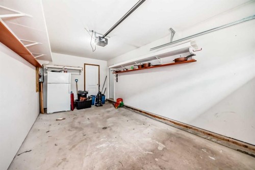 16E-32 Daines Avenue, Red Deer, AB - Indoor Photo Showing Garage