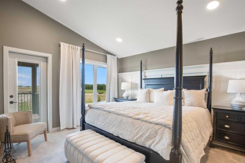 38 Springfield Boulevard, Sylvan Lake, AB - Indoor Photo Showing Bedroom