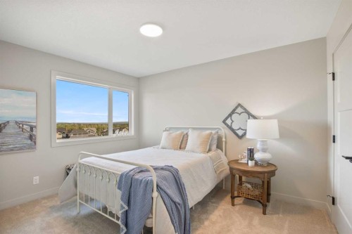 38 Springfield Boulevard, Sylvan Lake, AB - Indoor Photo Showing Bedroom