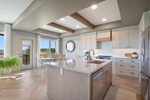 38 Springfield Boulevard, Sylvan Lake, AB - Indoor Photo Showing Kitchen With Upgraded Kitchen