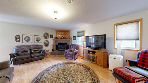 18320 Twp 39-0, Botha, AB - Indoor Photo Showing Other Room With Fireplace