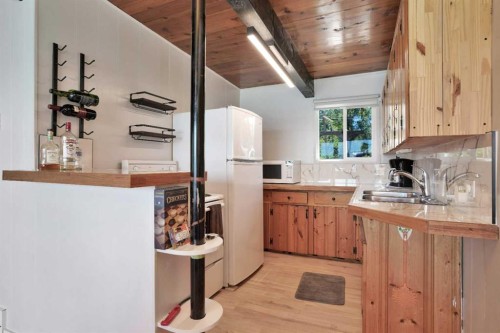 57 Grand Avenue, Norglenwold, AB - Indoor Photo Showing Kitchen With Double Sink