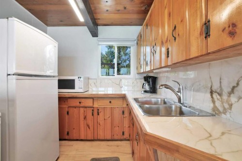 57 Grand Avenue, Norglenwold, AB - Indoor Photo Showing Kitchen With Double Sink