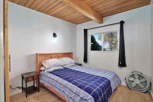 57 Grand Avenue, Norglenwold, AB - Indoor Photo Showing Bedroom