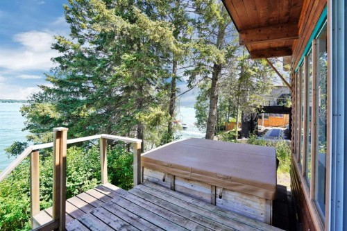 57 Grand Avenue, Norglenwold, AB - Outdoor With Body Of Water With Deck Patio Veranda