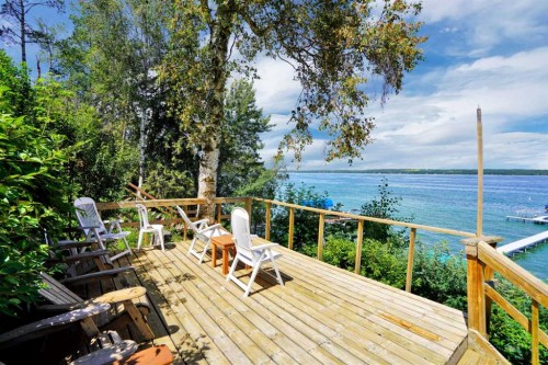 57 Grand Avenue, Norglenwold, AB - Outdoor With Body Of Water With Deck Patio Veranda With View