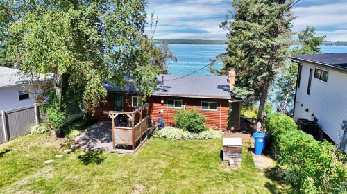 57 Grand Avenue, Norglenwold, AB - Outdoor With Body Of Water