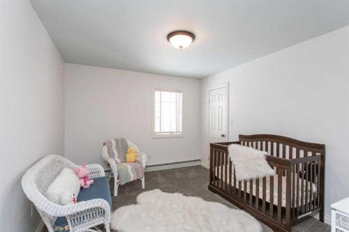 217-27111 Highway 597, Rural Lacombe County, AB - Indoor Photo Showing Bedroom