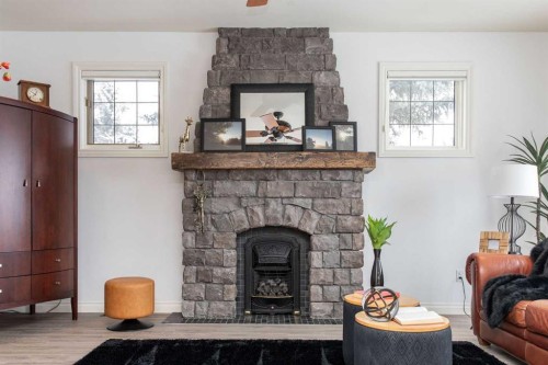 217-27111 Highway 597, Rural Lacombe County, AB - Indoor Photo Showing Living Room With Fireplace