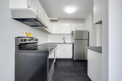 35-20 Alford Avenue, Red Deer, AB - Indoor Photo Showing Kitchen