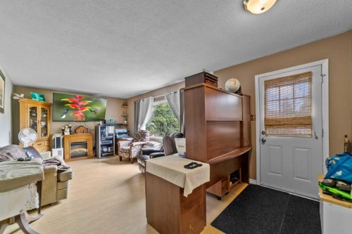 4903 53 Street, Innisfree, AB - Indoor With Fireplace