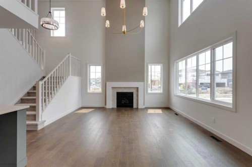21 Bayview Mews Sw, Airdrie, AB - Indoor With Fireplace
