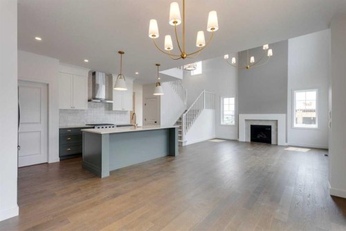 21 Bayview Mews Sw, Airdrie, AB - Indoor Photo Showing Kitchen With Upgraded Kitchen