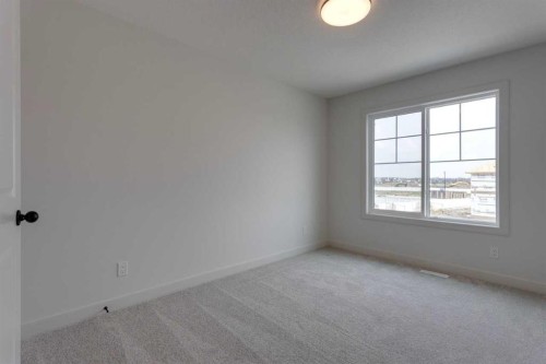 21 Bayview Mews Sw, Airdrie, AB - Indoor Photo Showing Other Room
