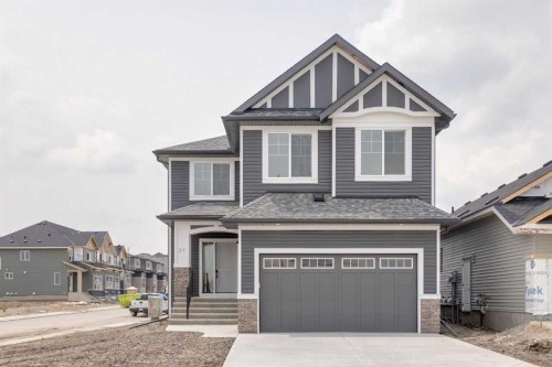21 Bayview Mews Sw, Airdrie, AB - Outdoor With Facade
