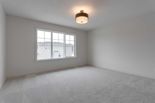 21 Bayview Mews Sw, Airdrie, AB - Indoor Photo Showing Other Room