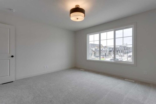 21 Bayview Mews Sw, Airdrie, AB - Indoor Photo Showing Other Room