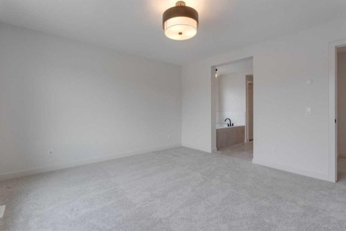 21 Bayview Mews Sw, Airdrie, AB - Indoor Photo Showing Other Room